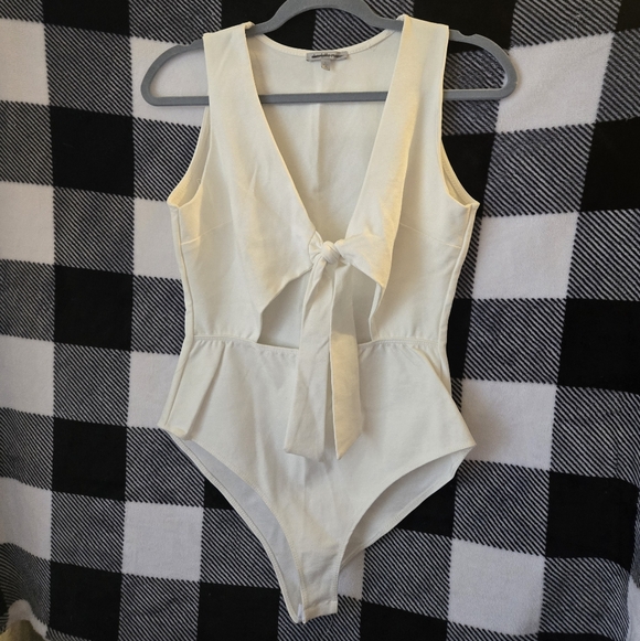 Charlotte Russe Other - Charlotte Russe Cream Bodysuit